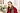 Lea Ypi mit einem roten Mantel und Schal